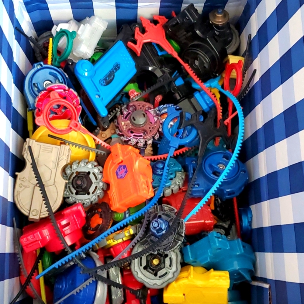 Beyblades, accessories and carrier